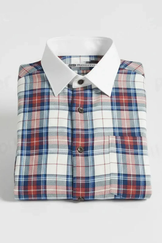 Folded plaid shirt with blue, red, and white pattern, featuring a crisp white collar and front pocket