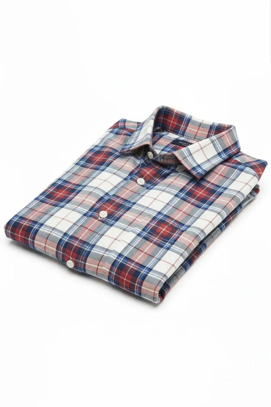 Folded long-sleeve red, white, and blue plaid shirt with buttons on white background
