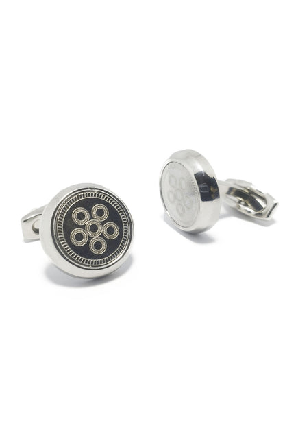 THE COSMIC CUFFLINK